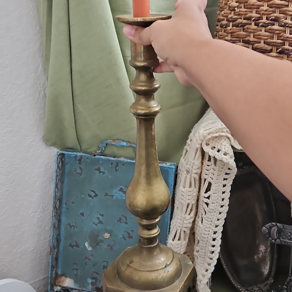 Tall brass candlestick holder